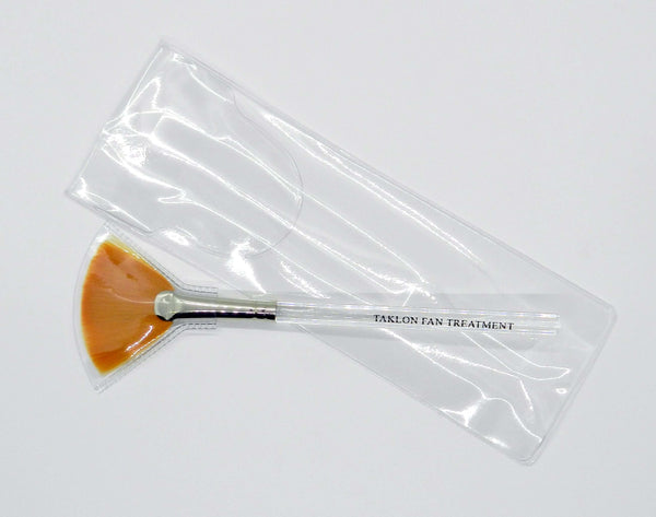 fan mask brush with clear plastic holder