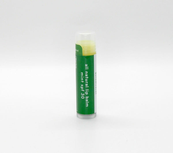 a tube of all natural mint lip balms with spf 30