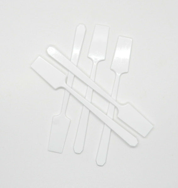 5 white spatulas